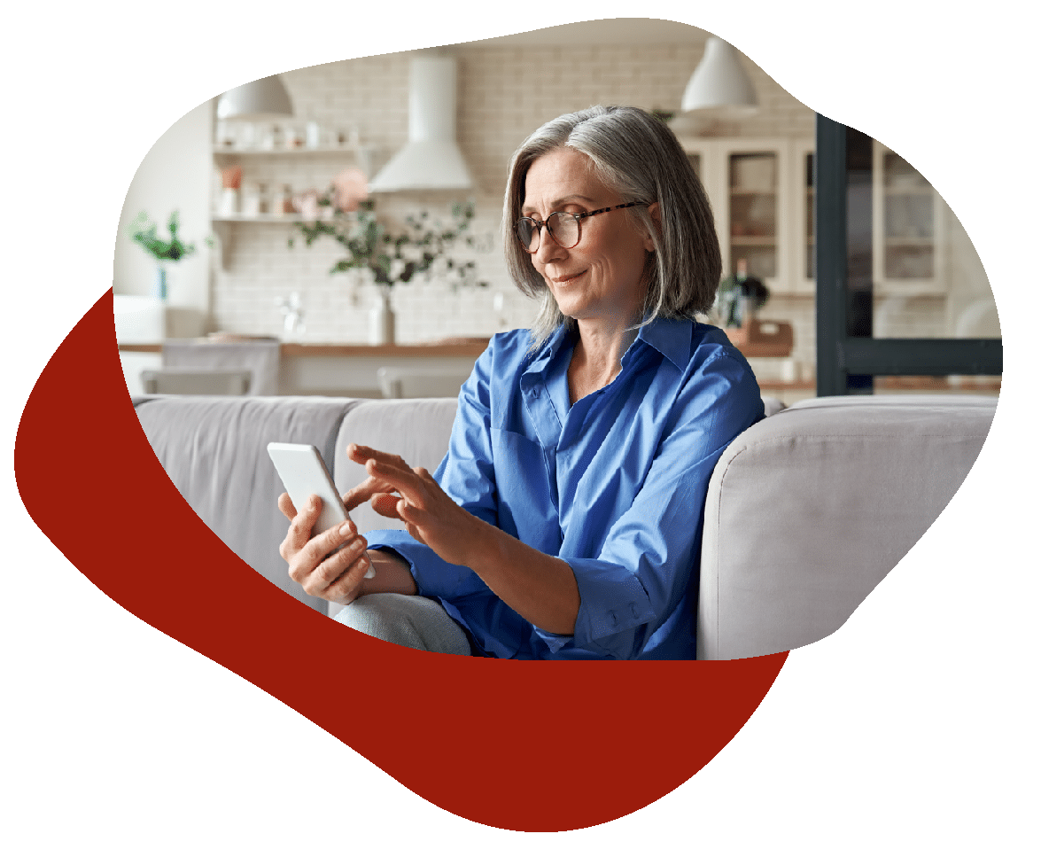 Older woman on phone taking the online hearing test